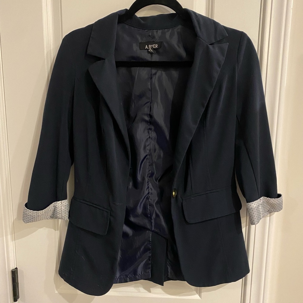 Blue blazer with cute polka dot detail. Small